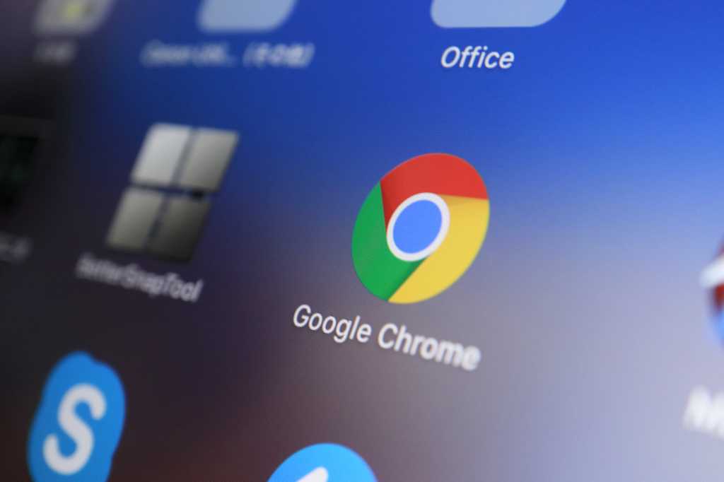 Chrome app icon on laptop screen with other app icons around it
